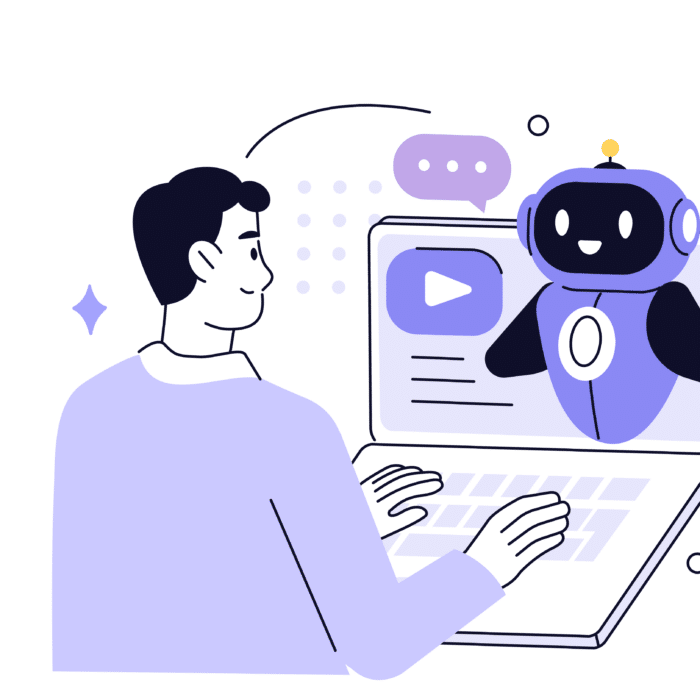 Mann sitzt vor Laptop, spricht mit einem freundlichen KI-Roboter auf dem Bildschirm.