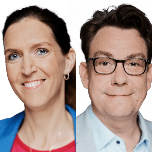 Porträt von zwei Personen: eine Frau mit langen Haaren und ein Mann mit Brille, beide lächeln freundlich.